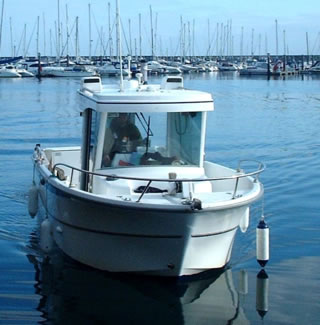 Tempus Fugit coming alongside at Brixham 2004